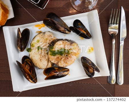 Hake medallions with mussels seafood platter Hake medallions with mussels seafood platter 137274402