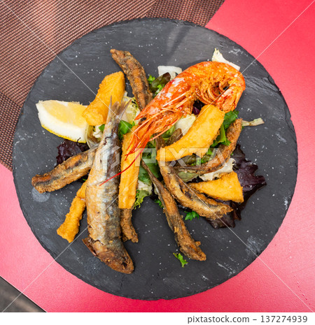 Grilled seafood and fish are specialty at coastal restaurant 137274939