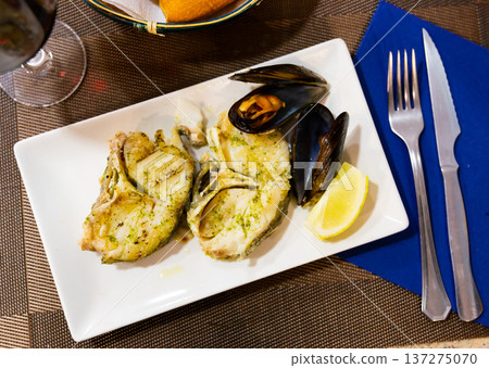 Hake medallions with mussels seafood platter 137275070