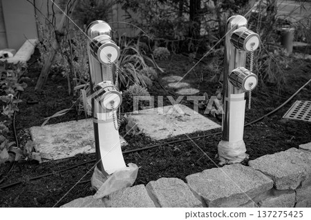 Newly constructed fire hydrant (black and white photo) Newly constructed fire hydrant (black and white photo) 137275425