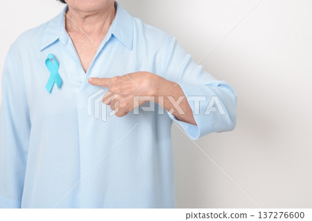 Elderly with blue Ribbon for Prostate Cancer Awareness month, April Child Abuse Prevention, National Bullying, September Addiction Recovery, May Chronic Fatigue Syndrome and January Human Trafficking Elderly with blue Ribbon for Prostate Cancer Awareness month, April Child Abuse Prevention, National Bullying, September Addiction Recovery, May Chronic Fatigue Syndrome and January Human Trafficking 137276600