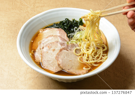 Japanese ramen chopsticks lifting scene 137276847