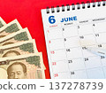 June calendar and money 137278739