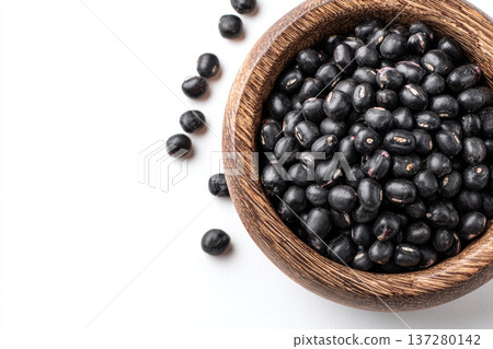 Black bean legume protein healthy organic dry wooden bowl food ingredient isolated on white background, clean minimal composition 137280142