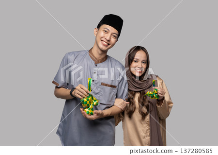 Male figure with green screen engaging in instructional display Male figure with green screen engaging in instructional display 137280585