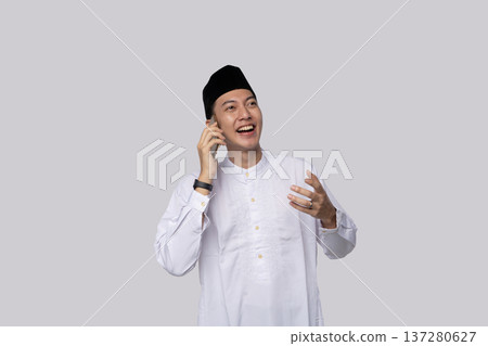 Happy man on phone conversation with expressive gesture 137280627