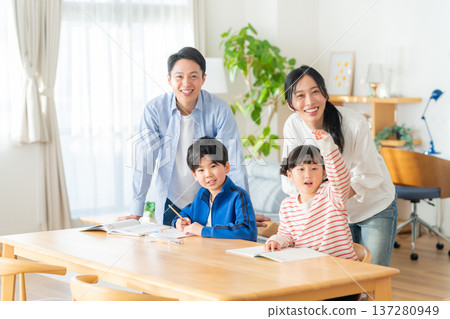 Children studying in the living room Children studying in the living room 137280949
