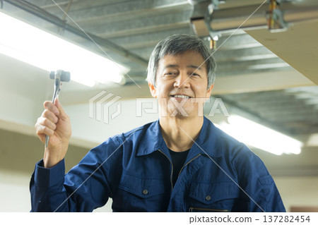 Men working at the factory Men working at the factory 137282454