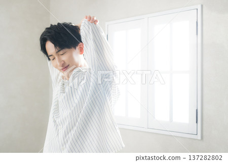 A young man growing 137282802