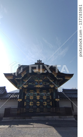 Vertical composition of the Karamon Gate and blue sky at Nijo Castle, Kyoto, Japan, a World Heritage Site 137283861