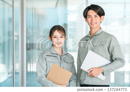 Electrical work, power company, architect, designer, engineer, maintenance, inspection, construction, architecture, men and women in work clothes 137284773