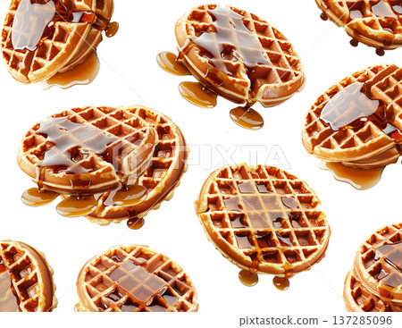 Golden brown waffles stacked and drizzled with syrup, isolated on a white background, concept of breakfast and sweet food 137285096