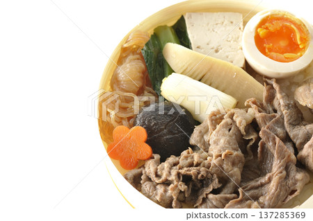 Sukiyaki bento box with plenty of ingredients photographed against a white background Sukiyaki bento box with plenty of ingredients photographed against a white background 137285369