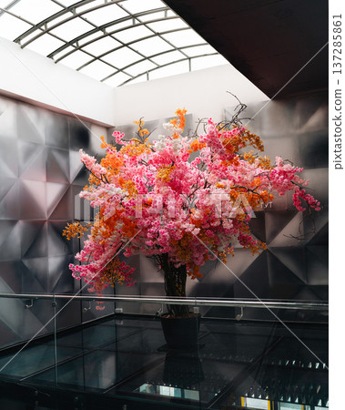 Decorative Flower Tree in Modern Shopping Mall Interior 137285861