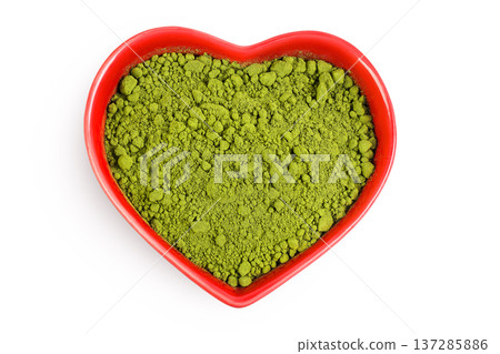 Green matcha powder in red ceramic bowl isolated on white background. Top view Green matcha powder in red ceramic bowl isolated on white background. Top view 137285886