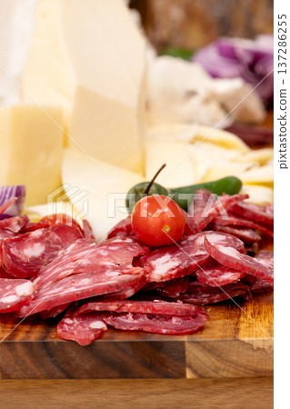 Sliced salami and cheese platter Sliced salami and cheese platter 137286255