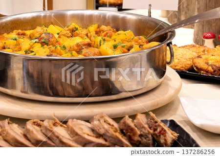 Roasted potatoes with meatballs in pan Roasted potatoes with meatballs in pan 137286256