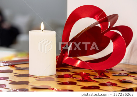 Valentine decoration with candle and red heart Valentine decoration with candle and red heart 137286262