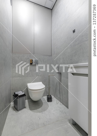 Modern Small Restroom with Grey Marble Tiles and Vertical Perspective Modern Small Restroom with Grey Marble Tiles and Vertical Perspective 137287369