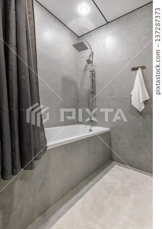 Modern Bathroom Interior with Bathtub and Rainfall Shower Modern Bathroom Interior with Bathtub and Rainfall Shower 137287373