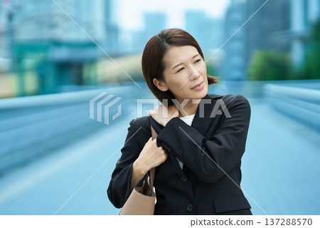 Businesswoman with a tired expression 137288570