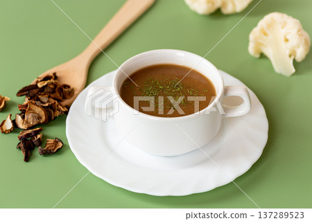 homemade mushroom soup with dried mushrooms garnish homemade mushroom soup with dried mushrooms garnish 137289523