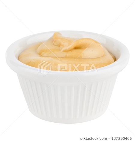Bowl with mustard sauce isolated on white background 137290466