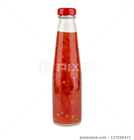 Glass bottle of chili sauce isolated on white background Glass bottle of chili sauce isolated on white background 137290471