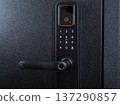 Modern smart door lock with digital keypad and biometric fingerprint access. 137290857