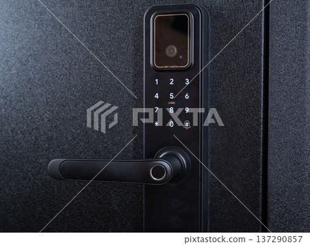 Modern smart door lock with digital keypad and biometric fingerprint access. Modern smart door lock with digital keypad and biometric fingerprint access. 137290857