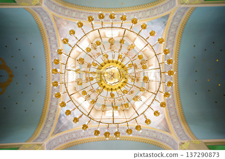 ceiling in the church with the illuminator. church lamp look from below 137290873