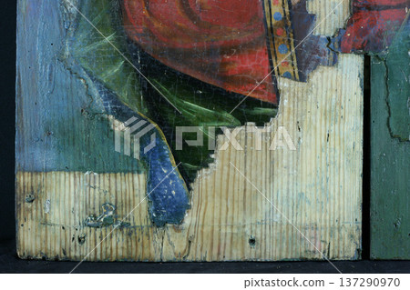 restoration of painting. fragment with probing in the process of restoration. old painting. 137290970