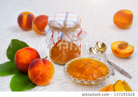 Peach jam in the jar on the table Peach jam in the jar on the table 137291028