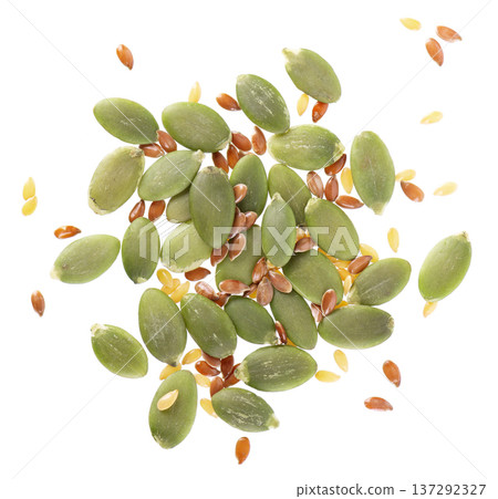 Pumpkin seeds with flax seed mix isolated on white background. Clipping path. Top view. 137292327