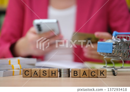 Exploring the excitement of digital shopping with cash back opportunities during a bright afternoon Exploring the excitement of digital shopping with cash back opportunities during a bright afternoon 137293418