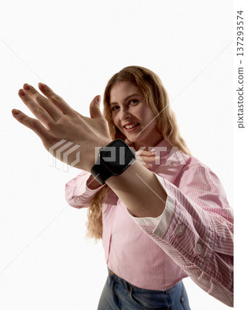 Woman checking smartwatch screen isolated on white background. Woman checking smartwatch screen isolated on white background. 137293574