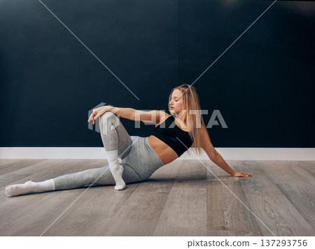 Portrait Of Beautiful Young Female Doing Stretching, Girl Exercising and Enjoying Fitness Training And Healthy Lifestyle. Yoga for healt. Portrait Of Beautiful Young Female Doing Stretching, Girl Exercising and Enjoying Fitness Training And Healthy Lifestyle. Yoga for healt. 137293756