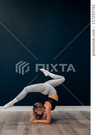 Portrait Of Beautiful Young Female Doing Exercising.Girl Stretching, And Enjoying Fitness Training And Healthy Lifestyle. Yoga For Health Portrait Of Beautiful Young Female Doing Exercising.Girl Stretching, And Enjoying Fitness Training And Healthy Lifestyle. Yoga For Health 137293782