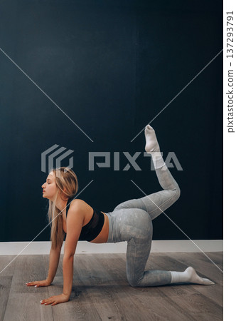 Portrait Of Beautiful Female Doing Exercising.Woman Stretching, And Enjoying Fitness Training And Healthy Lifestyle. Yoga For Health. Portrait Of Beautiful Female Doing Exercising.Woman Stretching, And Enjoying Fitness Training And Healthy Lifestyle. Yoga For Health. 137293791