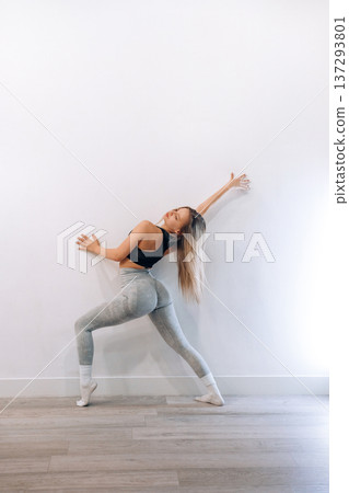 Portrait Of Beautiful Young Female Doing Exercising.Woman Stretching, And Enjoying Fitness Training And Healthy Lifestyle. Yoga For Health Portrait Of Beautiful Young Female Doing Exercising.Woman Stretching, And Enjoying Fitness Training And Healthy Lifestyle. Yoga For Health 137293801
