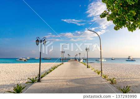 Bright sky above long sandy beach Bright sky above long sandy beach 137293990