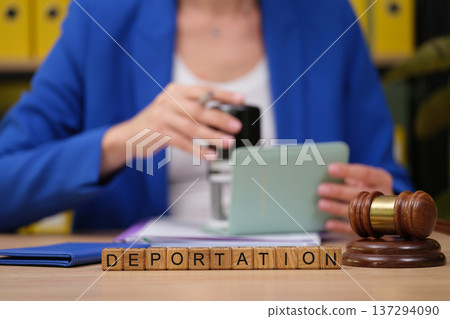 Discussing legal matters related to deportation in a professional office setting during the daytime Discussing legal matters related to deportation in a professional office setting during the daytime 137294090