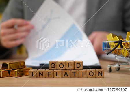 Exploring the impact of gold on inflation while analyzing market trends with financial tools and gold bars 137294107