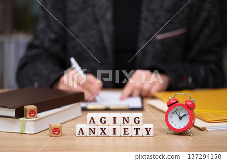 Exploring the emotions of aging anxiety through reflection and planning in a cozy workspace Exploring the emotions of aging anxiety through reflection and planning in a cozy workspace 137294150