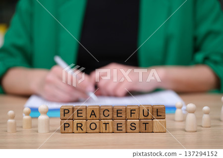 People gather to support a peaceful protest as messages of change and unity fill the air with hope and determination 137294152
