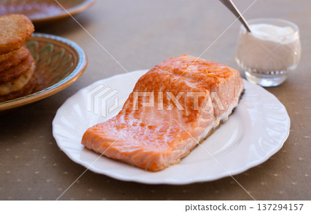 Fried Salmon Fillet with Sauce in Crystal Glass 137294157