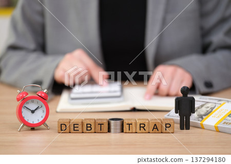 Explore the impact of financial struggles in modern life through a captivating scene of a debt trap with contrasting elements 137294180