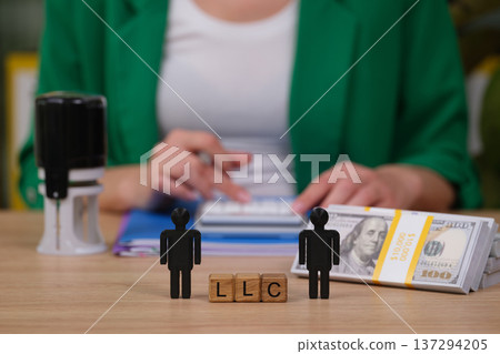 Building a successful LLC with financial planning and management at the forefront in a modern office setting 137294205