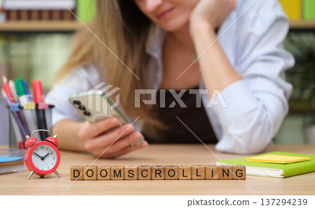 Exploring the world of doomscrolling during a quiet afternoon in a cozy workspace 137294239