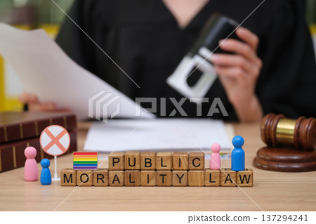 Discussion on morality law in a courtroom with symbolic elements and diverse representations Discussion on morality law in a courtroom with symbolic elements and diverse representations 137294241